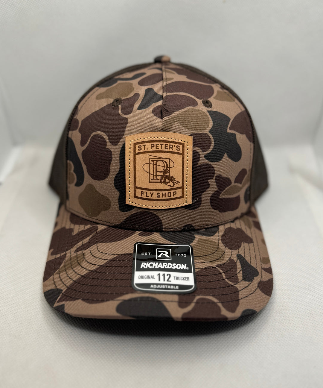 Richardson Sports St. Peter's Classic Logo Leather Patch Trucker Hat Bark Duck Camo / Brown One Size